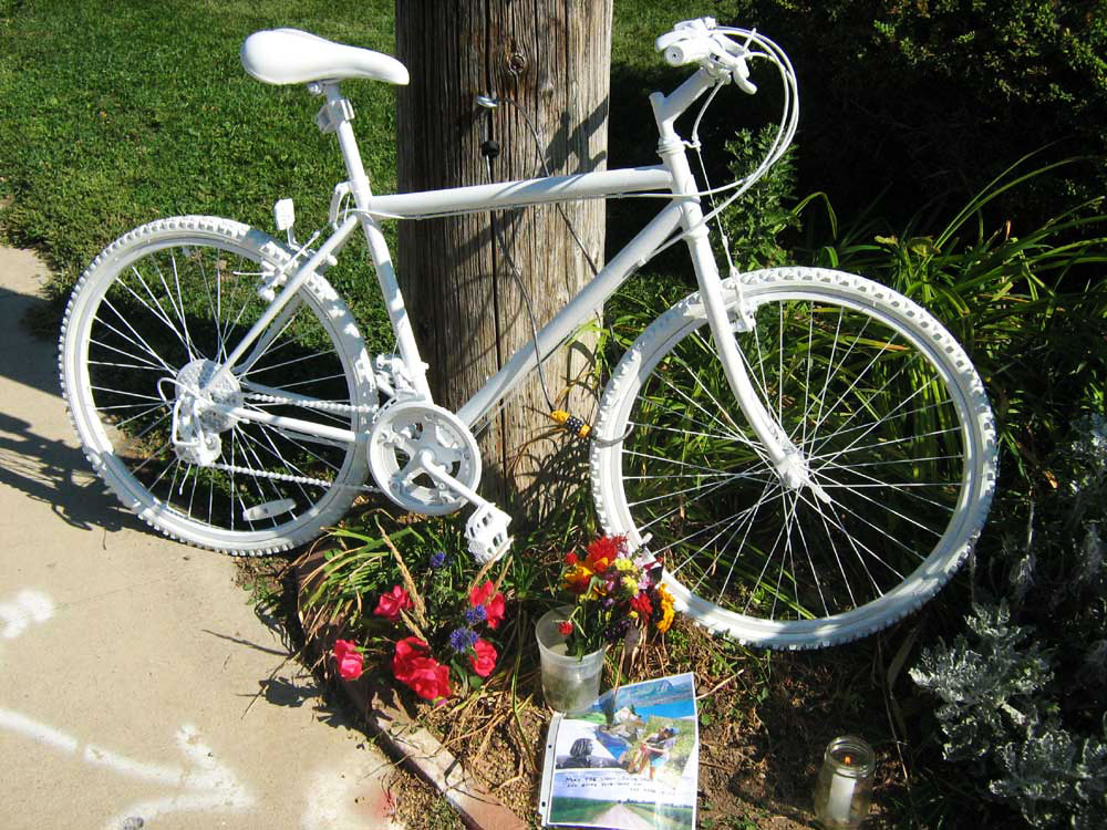 Ghost bikes have been installed on roadways across the country where cyclists were killed by motorists, like this bike in Boulder, Colorado, in memory of Matthew Powell in 2008.